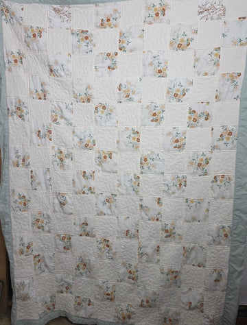 White floral quilt